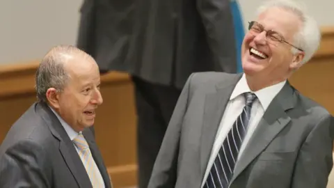 Alamy Claude Heller (left), Permanent Representative of Mexico to the UN, and Vitaly I. Churkin, Permanent Representative of the Russian Federation to the UN, share a laugh prior to a Security Council meeting on the situation in the Middle East and the question of Palestine.