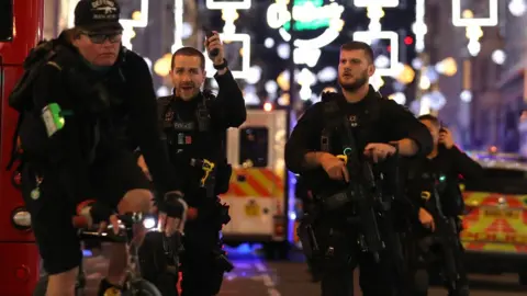 Getty Images Armed police in Oxford Street