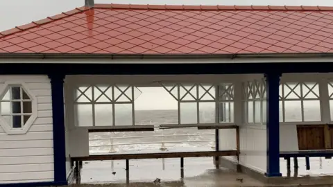 A damaged shelter on Aberystwyth prom