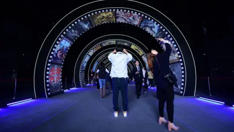 AFP People visit a film studio at Wanda Film industrial park in Qingdao, China's Shandong province on April 28, 2018