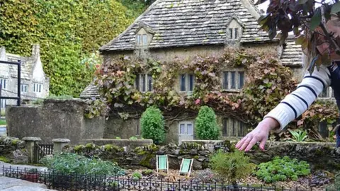 Grade II listed Cotswold model village on the market