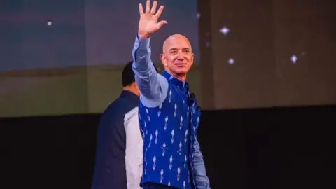 Getty Images Jeff Bezos waving