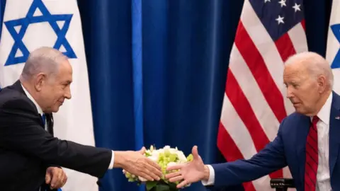 Getty Images US President Joe Biden shakes hands with Israeli Prime Minister Benjamin Netanyahu as they meet on the sidelines of the 78th United Nations General Assembly in New York City on September 20, 2023