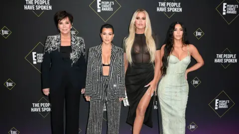 Getty Images Kris, Kourtney, Khloé and Kim