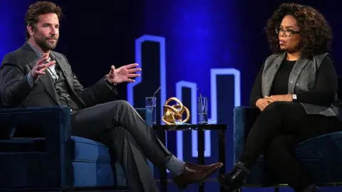Getty Images Bradley Cooper and Oprah Winfrey