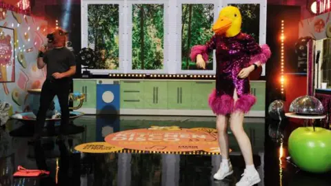 Sophie Ellis-Bextor and Dermot O'Leary in animal masks during dance challenge