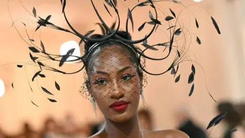 Nigerian singer Tems arrives for the 2023 Met Gala at the Metropolitan Museum of Art on May 1, 2023, in New York. - The Gala raises money for the Metropolitan Museum of Art's Costume Institute. The Gala's 2023 theme is "Karl Lagerfeld: A Line of Beauty."
