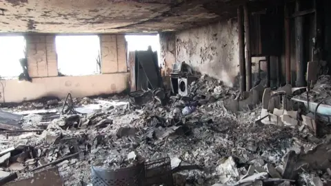 Met Police Inside of burnt out flat at Grenfell Tower