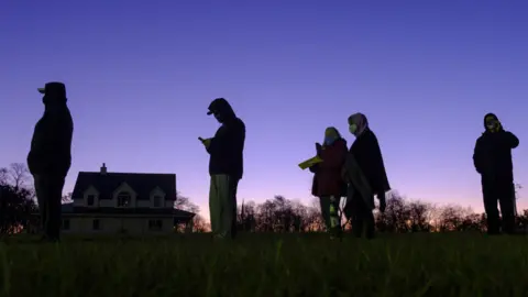 Getty Images Voters queue in Indiana