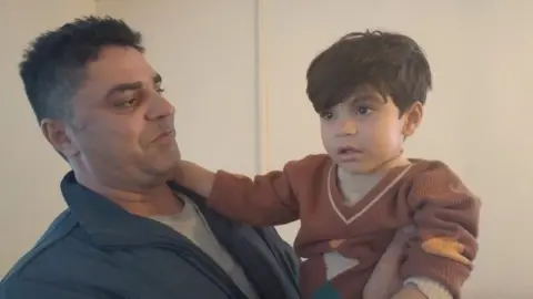 Noorullah Hashmi and his eldest son