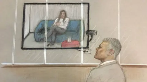 JULIA QUENZLER Ryan Giggs watched as Kate Greville's police interview was played for the jury