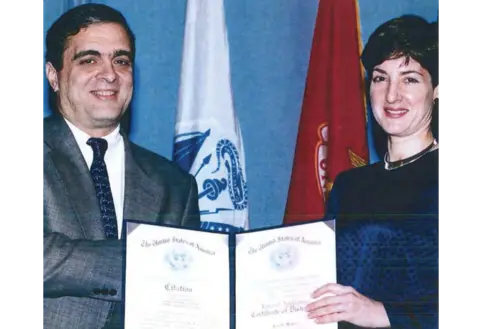 US Department of Defense Montes receives a National Intelligence Certificate of Distinction from George Tenet of the CIA