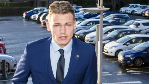Falkirk forward Joe McKee arrives at Hampden for his first disciplinary hearing last month