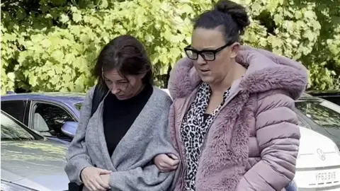 PA Media Lyne Barlow (left) outside Durham Crown Court