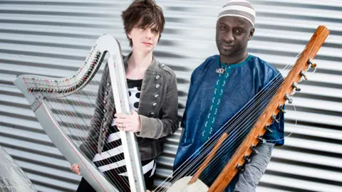 Judith Burrows/Getty Images Catrin Finch and Seckou Keita