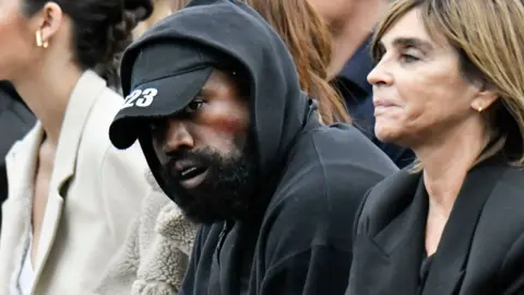 Getty Images Kanye West at Paris Fashion Week