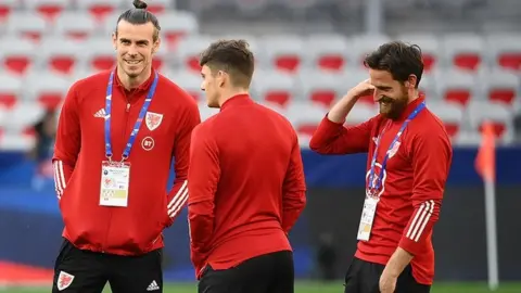 Getty Images Gareth Bale and members of the Wales team