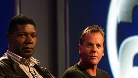 Getty Images Dennis Haysbert and Kiefer Sutherland, who played David Palmer and Jack Bauer