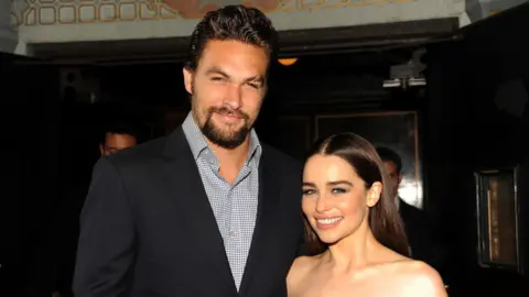 Getty Images Emilia and Jason at the season three premiere in 2013