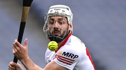 The late Damian Casey