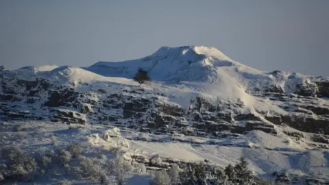 Elaine Evans A snow-covered Morlais Castle in Merthyr Tydfil