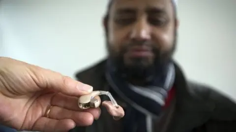 Getty Images man and hearing aid