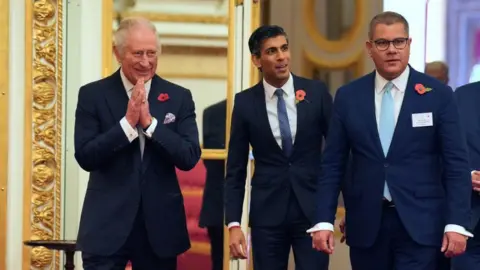 Getty Images The King, Rishi Sunak and Alok Sharma