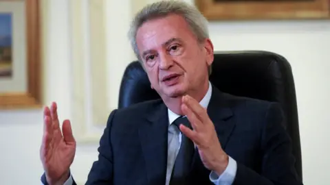 Reuters File photo showing Lebanon's central bank governor Riad Salameh speaking during an interview in Beirut, Lebanon (23 November 2021)