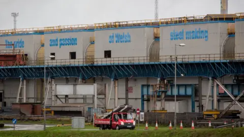 Getty Images Port Talbot steelworks building with the words written The Pride of Welsh Steel Making on it