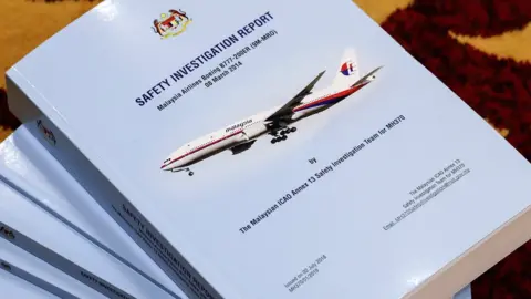 EPA The MH370 safety investigation report at the Ministry of Transport headquarters in Putrajaya, Malaysia, 30 July 2018