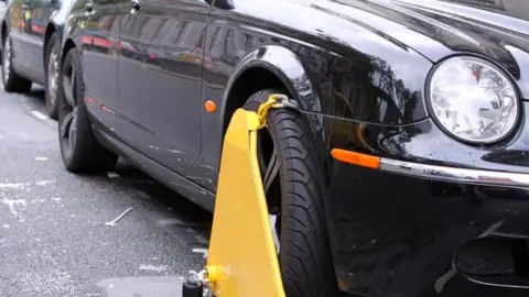 Getty Images Untaxed car clamped