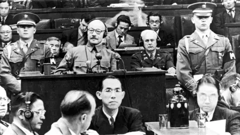 Getty Images Former Japanese Prime Minister Hideki Tojo seen in a court surrounded by people