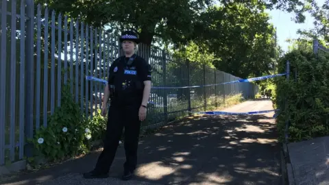 Police officer at the scene of the stabbing