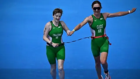 Getty Images Chloe MacCombe and her guide Catherine Sands competing at the 2022 Commonwealth Games in Birmingham