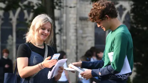 PA Media Candidates receive results in Norwich on 13 August 2020