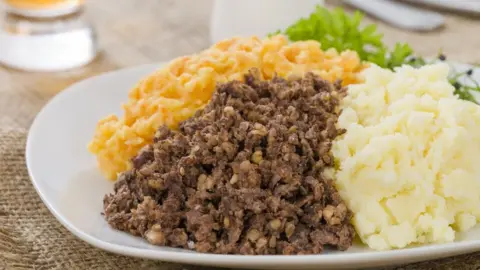 Getty Images Haggis, turnips and carrots on a plate, the traditional burns meal