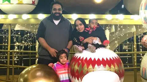 BBC Altuf with his family