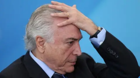 Reuters Brazil's President Michel Temer reacts during a ceremony at the Planalto Palace in Brasilia (13 July 2017)