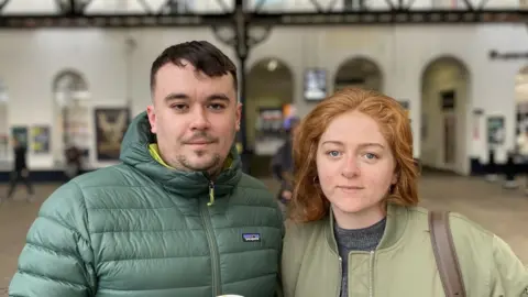 Ben Jackson and Arabella Saucell at Brighton station