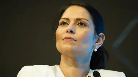 PA Media Priti Patel