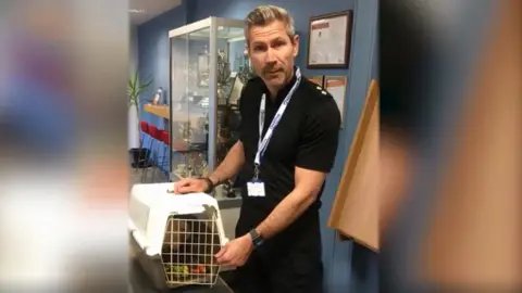 Nottinghamshire Police Insp Marcus Oldroyd with the rabbit