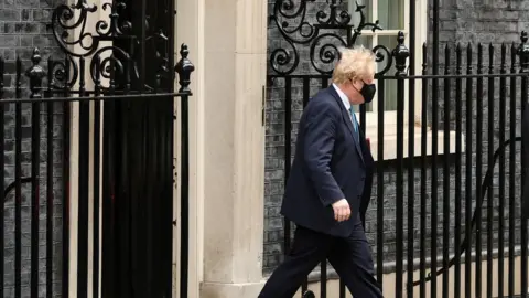 Reuters Boris Johnson leaving Downing Street