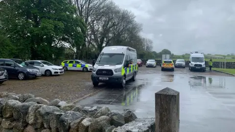 Police cars in a car park