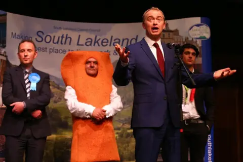 Dave Thompson/Getty images Leader of the Liberal democrats Tim Farron celebrates beating Conservative party candidate James Airey (L) Independent candidate Mr Fishfinger and Labour candidate Eli Aldridge (R) following the announcement of the results at the Westmoorland and Lonsdale constituency count at Kendal Leisure Centre on June 9, 2017 in Kendal,