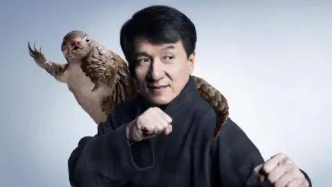 WildAid Jackie Chan and a pangolin