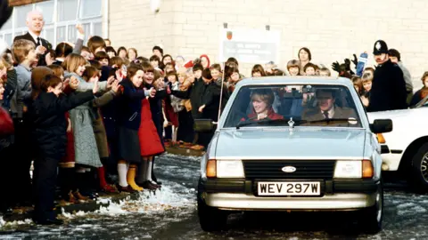 Getty Images Princess Diana pictured driving one of the new Ford Escorts in 1981