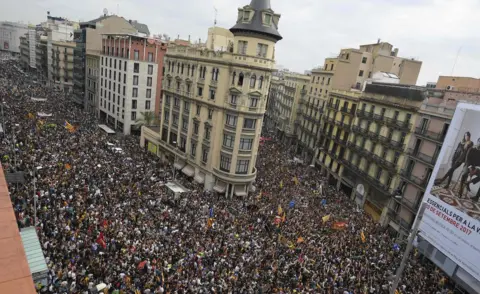 AFP Protesters gather at the Placa de la Universitat square in Barcelona on 3 October