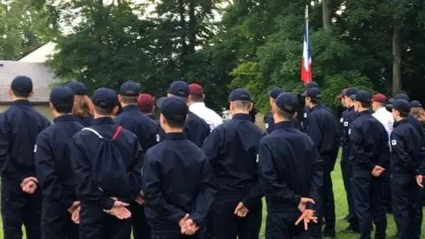 Standing to attention for the anthem