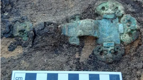 Suffolk County Council Cruciform brooch found at the Anglo-Saxon cemetery at Oulton