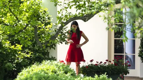 Reuters Madeleine Westerhout, secretary to US President Trump, stands outside the Oval Office in May 2018